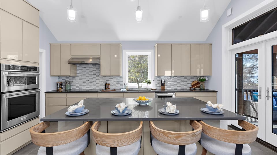 The island provides the perfect place to chat while cooking your favorite meals.