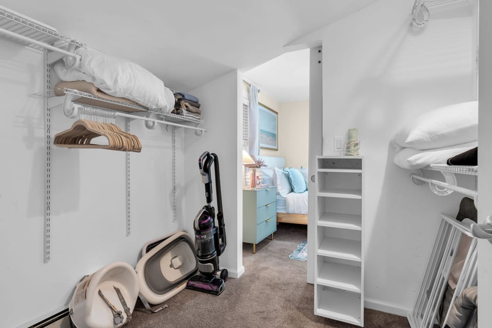 Spacious walk-in closet with extra linens, storage, and family-friendly amenities