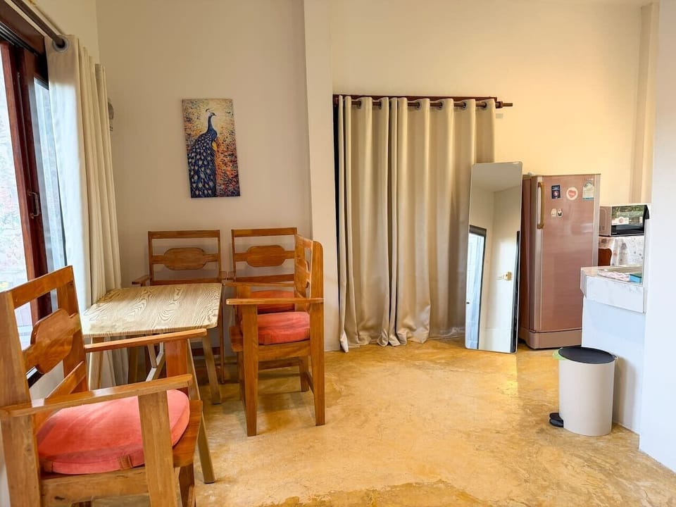 Dining table for four next to the kitchen