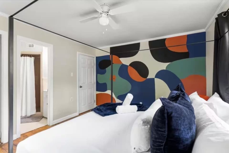 Rest in a thoughtfully designed bedroom made for comfort and relaxation.