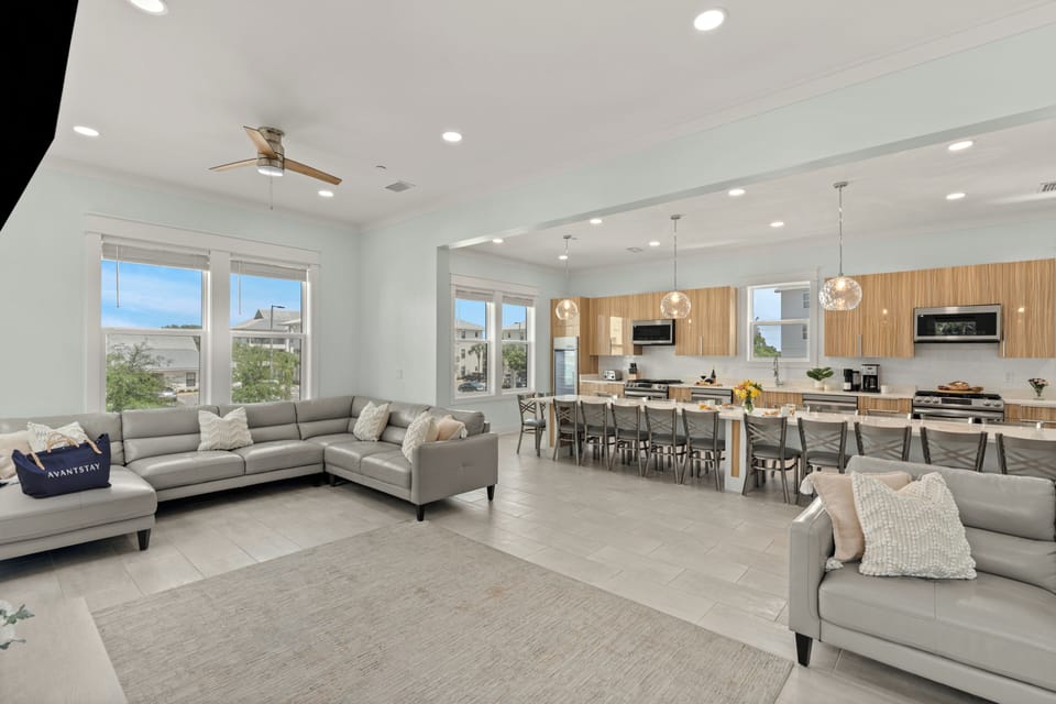 Spacious open-concept living area with two lounges, dual kitchens, and room for the whole group to gather.