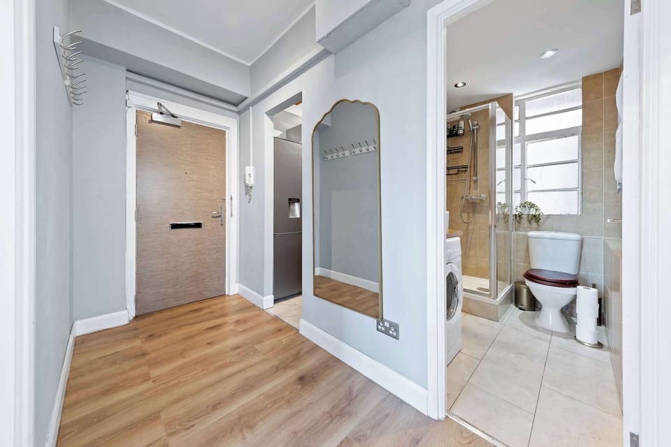 Stylish interior with wooden flooring that brings warmth and natural charm.