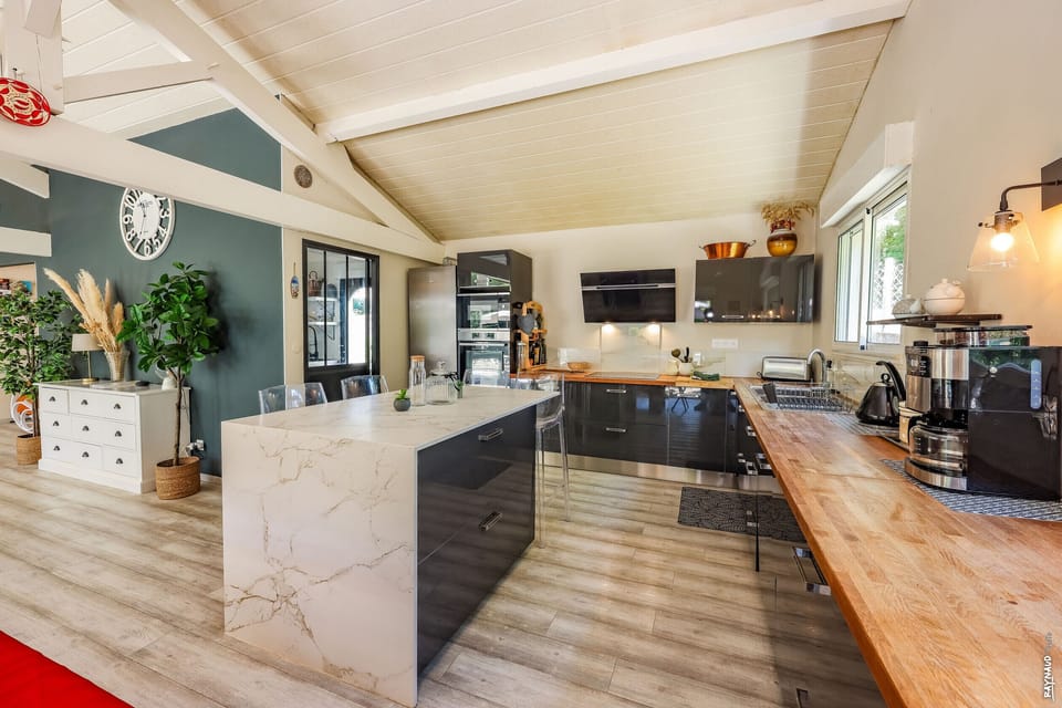 Fully equipped kitchen opening onto the living room