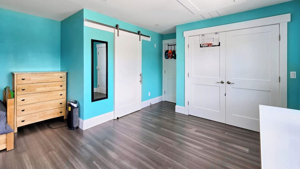 Bedroom with pyramid bunk shares Jack and Jill bathroom