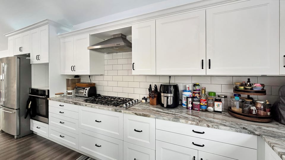 Nicely equipped kitchen with stainless appliances