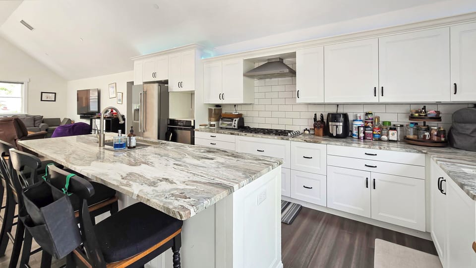 Nicely equipped kitchen with stainless appliances