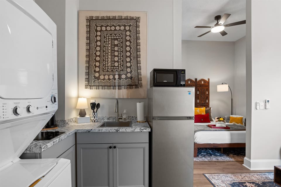 Stovetop double burner, microwave, and fridge