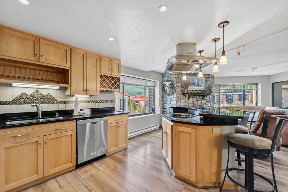 Bright Mountain Modern Kitchen with Updated Finishes, Spacious Countertops & Open-Concept Design