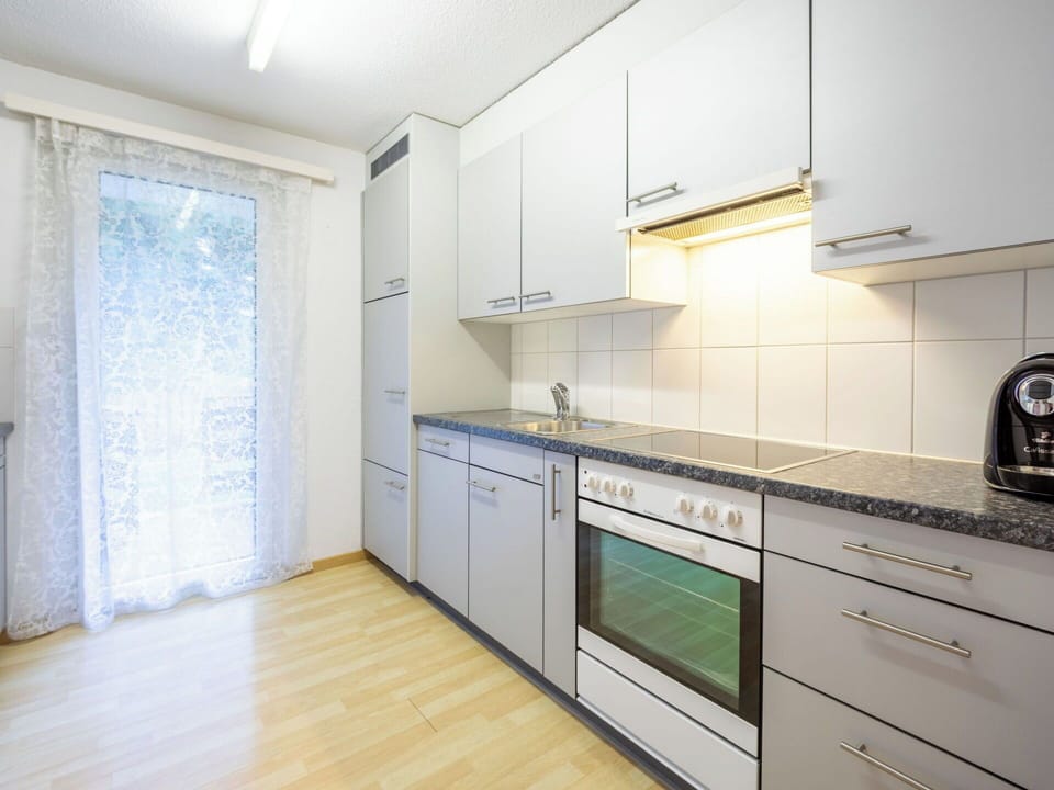 Flooring, Interior Design, Floor, Ceiling, Wood Flooring, Room, Apartment, Kitchen, Major Appliance, Hardwood