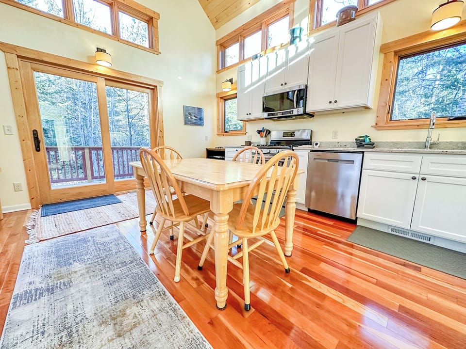 The dining area/kitchen is perfect for enjoying a home cooked meal during your stay.