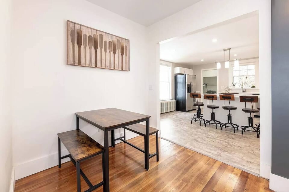 Seating for 4 in the eating nook and 6 more seats around the oversized kitchen island/table.