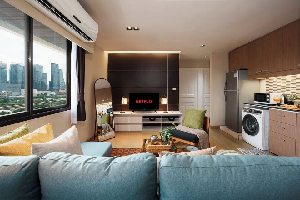 【Living Room】With Cozy Flexibility,choose from various pillows for extra comfort,extend the sofa into a bed for movie nights, or gather with friends for a cooking gathering in this spacious space.