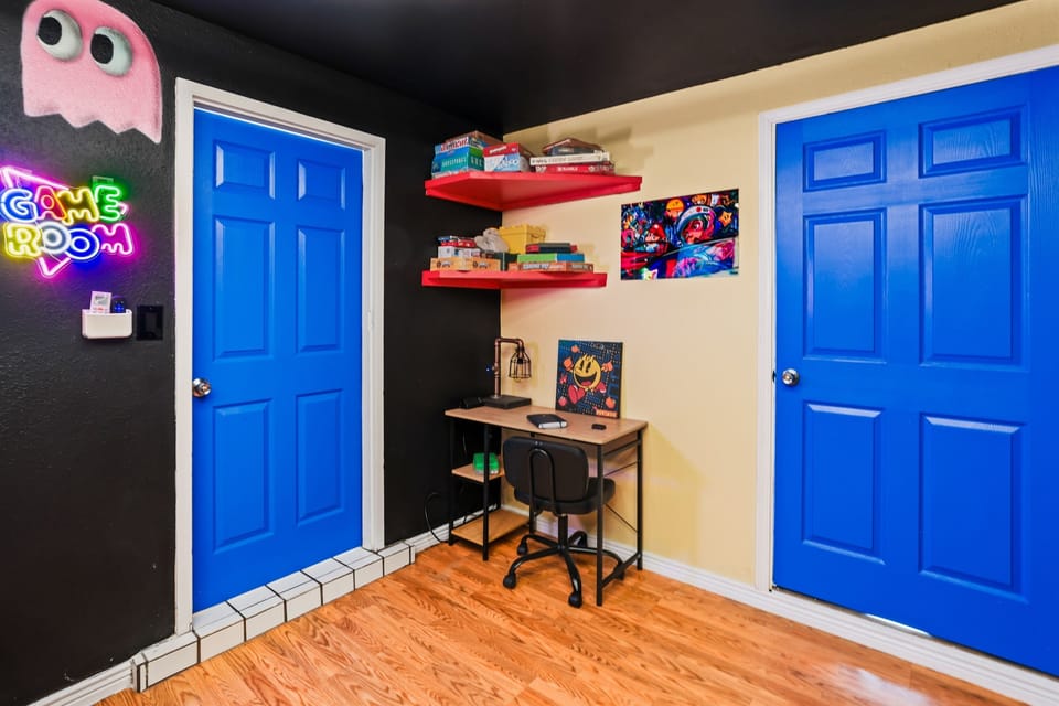 Workspace located in game room. 
Game Room doubles as a 5th Bedroom.