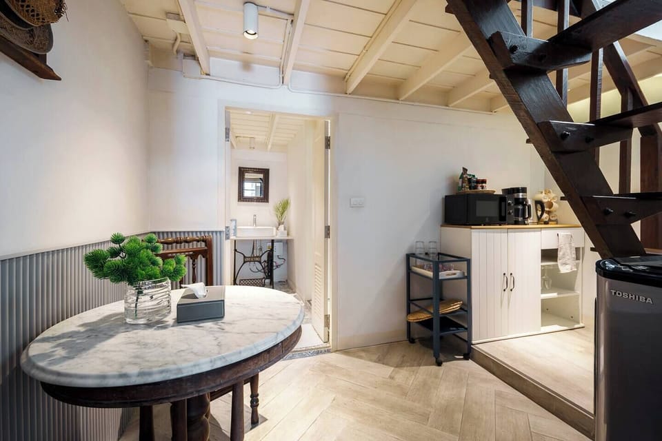 On your right sides hand, the kitchenette corner features all the essentials you need to cook local dishes or store your groceries.
