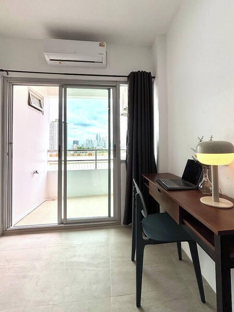 Step out onto your private balcony and take in sweeping views of the Thonglor neighborhood especially stunning at night when the city comes alive.
The curtains help block out light effectively, making the room feel more cozy and private.