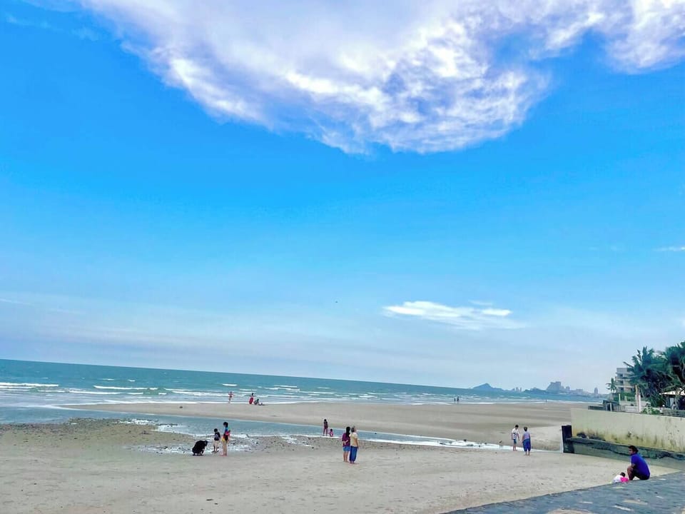 Enjoy a peaceful walk through the local neighborhood to Queen 19 Rai Park Beach, just under 10 minutes away—depending on your pace!