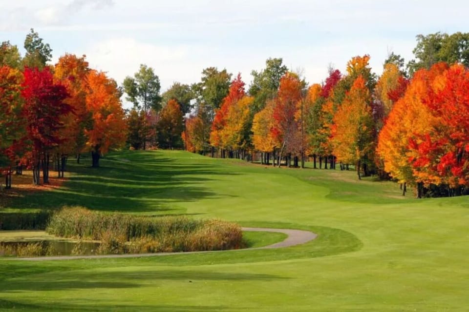 Tee off nearby and soak up vibrant autumn fairway views.