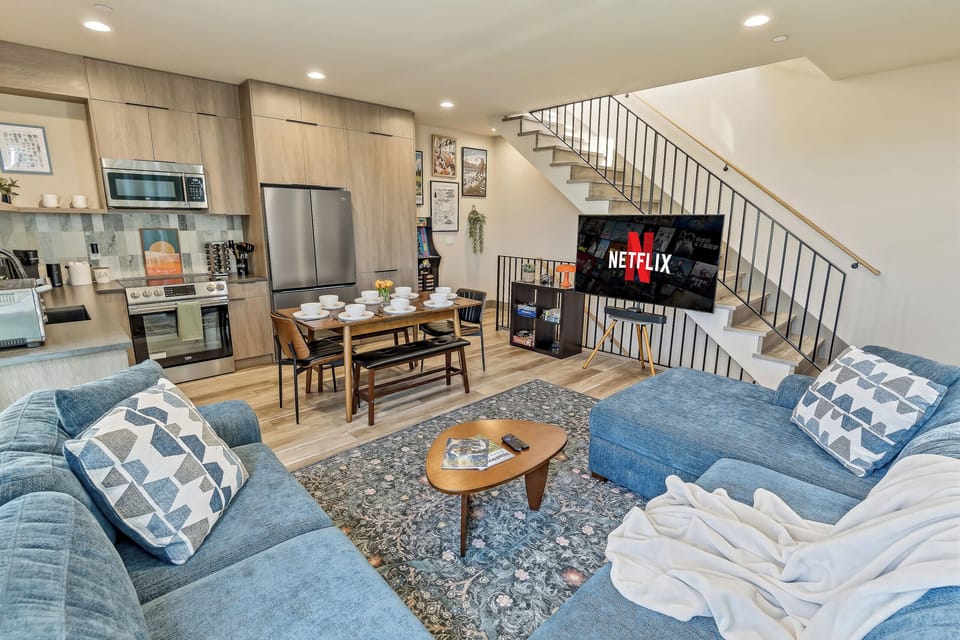 Modern warmth meets cozy seating in this inviting space.