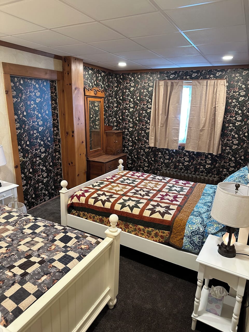 Full size & twin beds. Large closet space, dresser & mirror. Charging stations