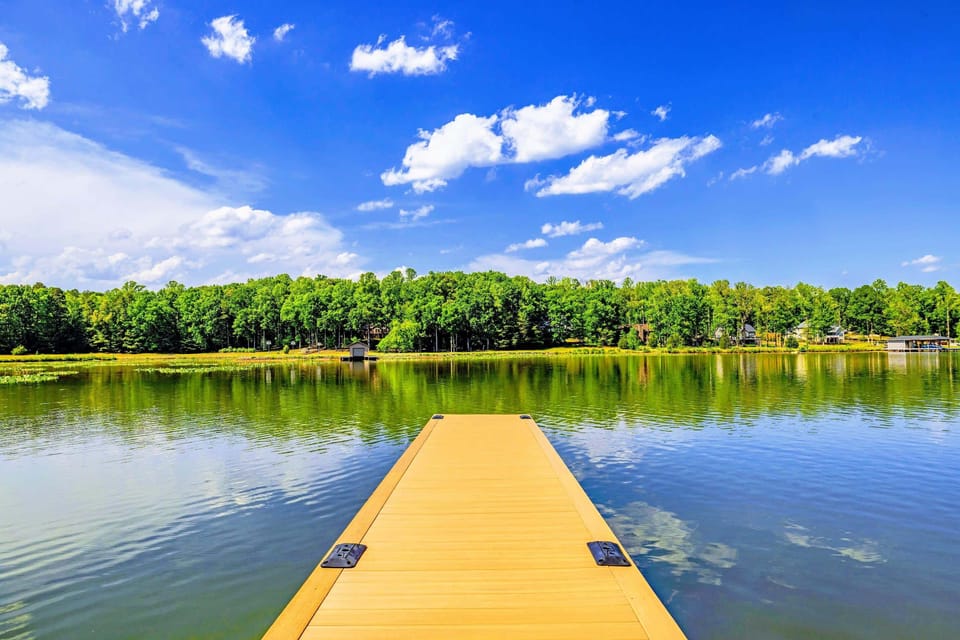 Dock - The walkway leads straight out over the water, fishing rod or coffee mug optional.