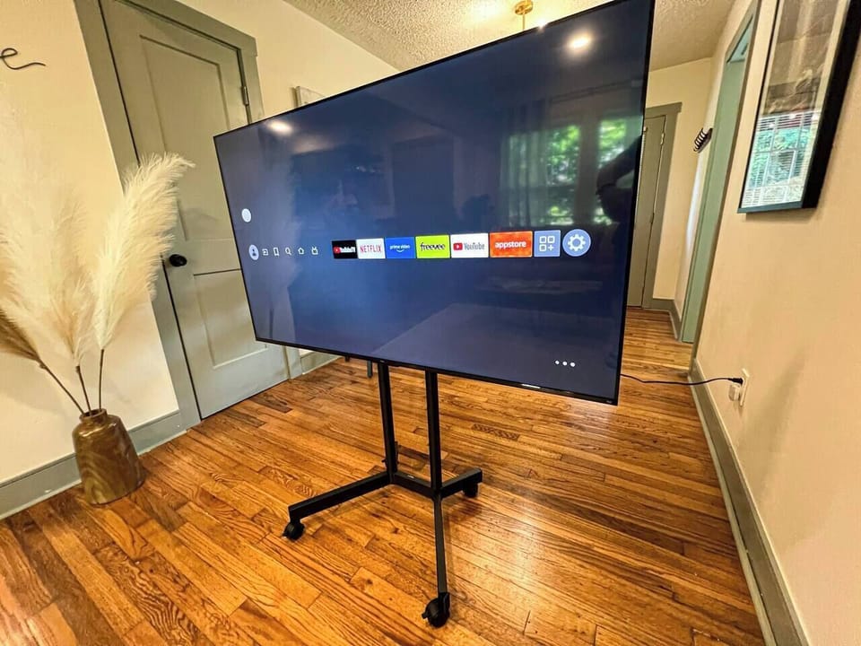 65 inch smart TV can be rolled into any room within the home