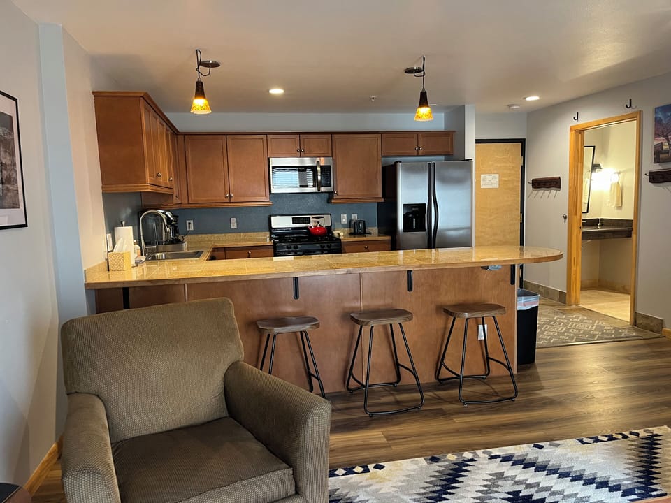 Your open-concept kitchen invites you to cook and gather together, the breakfast bar is perfect for morning coffee or casual dining.