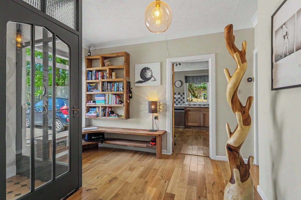 A welcoming hallway that sets the tone for the home, with stylish touches and a calm, coastal feel from the moment guests arrive.