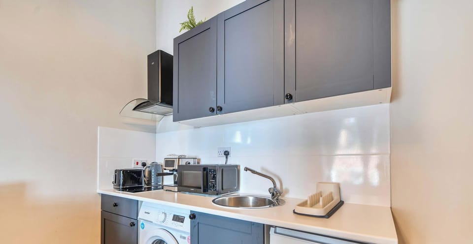FULLY EQUIPPED KITCHEN WITH EVERYTHING NEEDED FOR HOME-COOKED MEALS