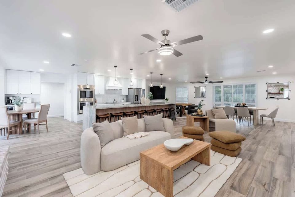 Settle in and feel at home in this bright, open-concept living area designed for gathering and relaxation. Natural light fills the space where you can unwind after a day of exploring.