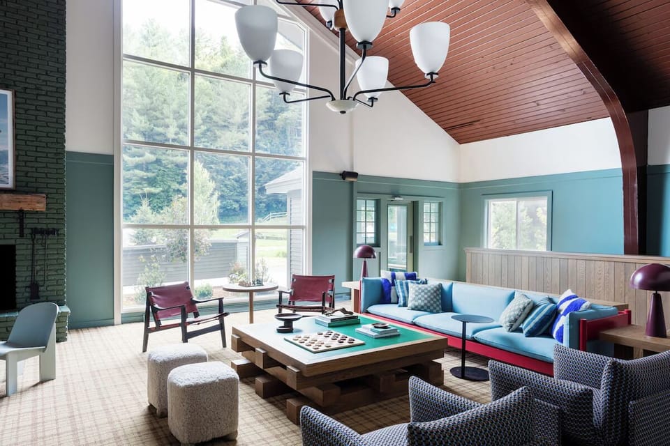 Unwind beneath soaring ceilings and wall-to-wall windows.