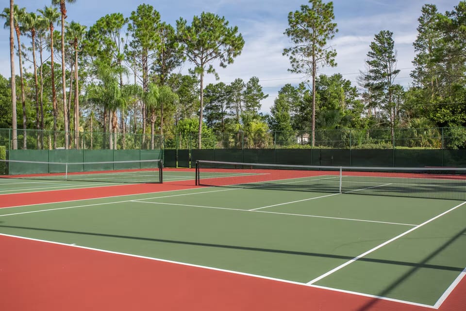 Play a sunny match on well-kept courts surrounded by pines.