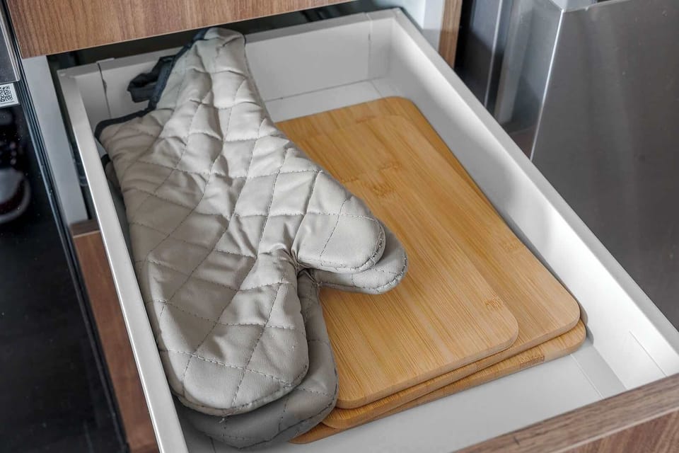 Cooking essentials including oven mitts and tools