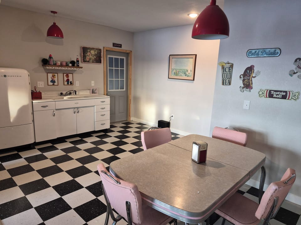 basement dining/kitchenette, indoor, refrigerator, dining table