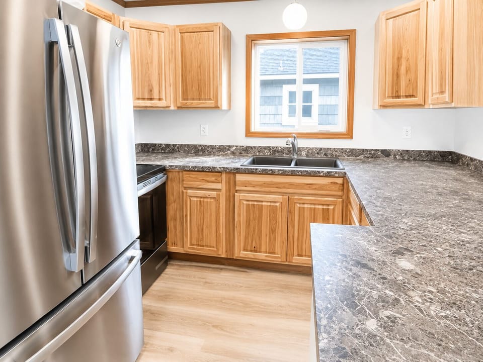 Bright kitchen for easy breakfasts, snacks, and relaxed dinners at the cabin.
