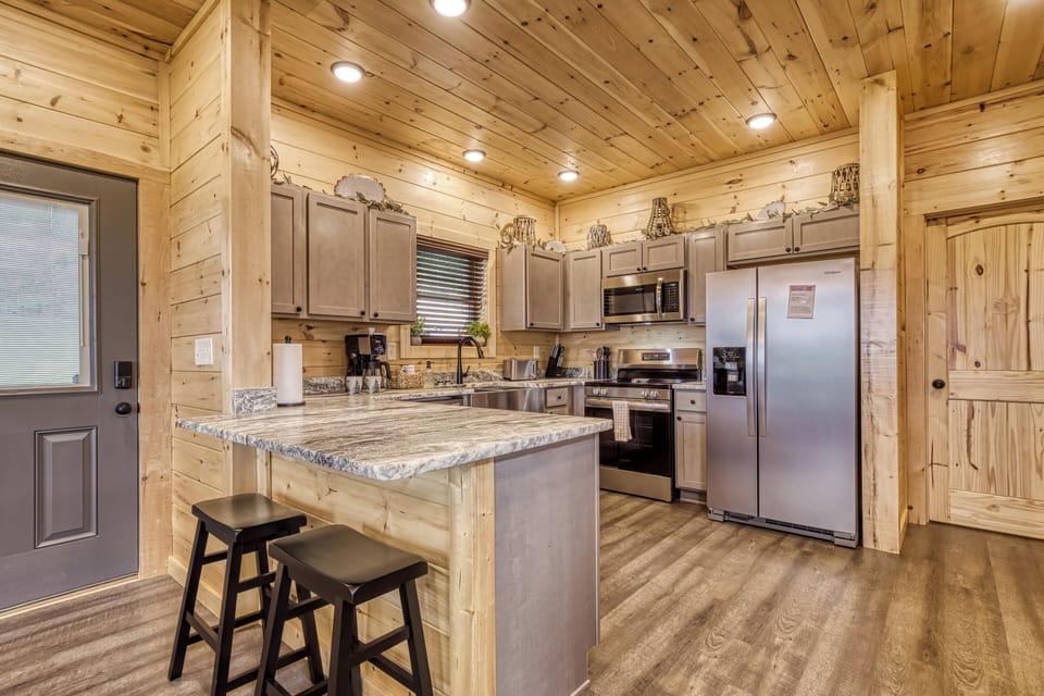 Smoky Mountain Vacation Rental with a View "In The Clouds" - Fully furnished kitchen with granite countertops and stainless steel appliances