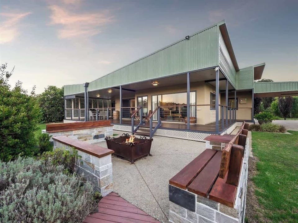 Surrounded by landscaped gardens and open skies, the fire pit is perfect for sharing stories, toasting marshmallows, and enjoying the peaceful country atmosphere.