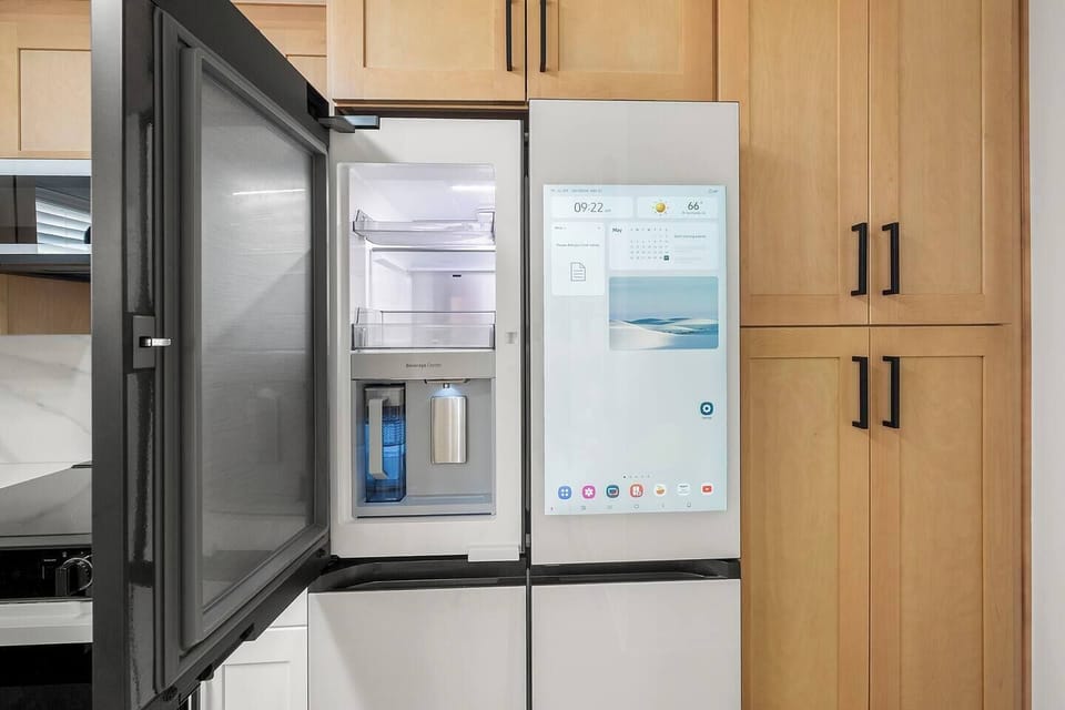 The Samsung smart fridge adds modern convenience with a built-in beverage center, touchscreen display, and customizable temperature zones bringing luxury and tech together for a seamless stay.