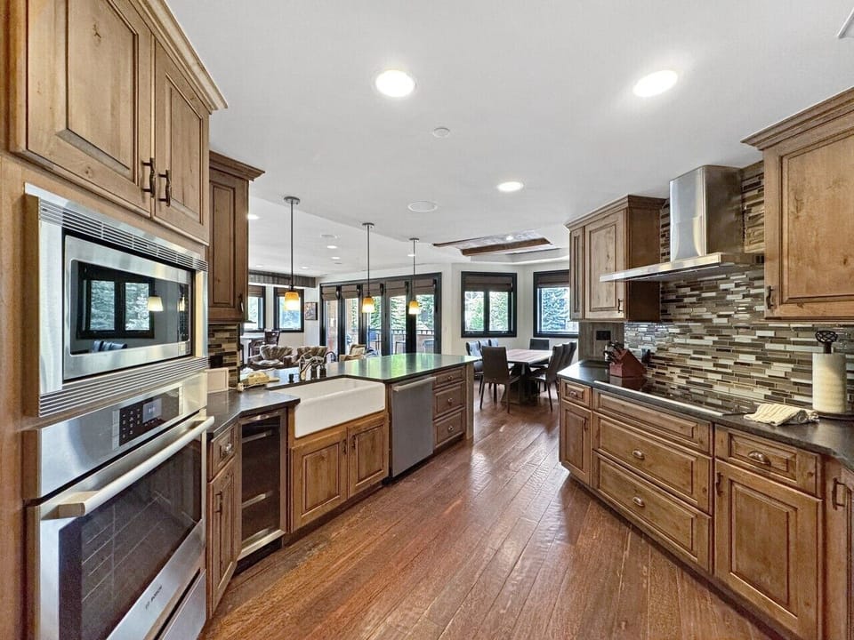 Cook, connect, and never miss a moment. This spacious kitchen opens right into the heart of the condo, keeping whoever`s cooking fully wrapped in the warmth, laughter, and flow of Beaver Creek