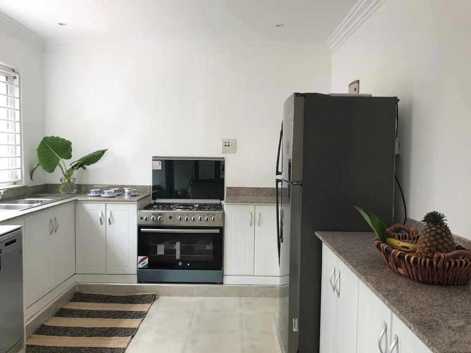 Specious Modern and fully equipped Kitchen ready for our chef to step in and cook for you.  