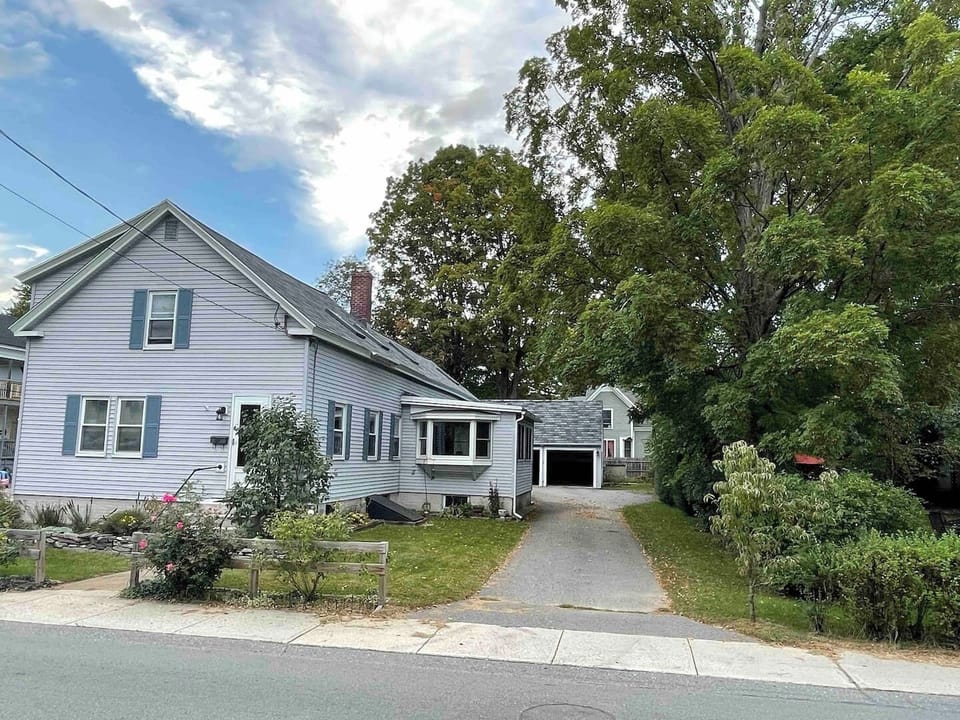 House, garden, driveway, Two car garage and plenty of parking on the driveway.