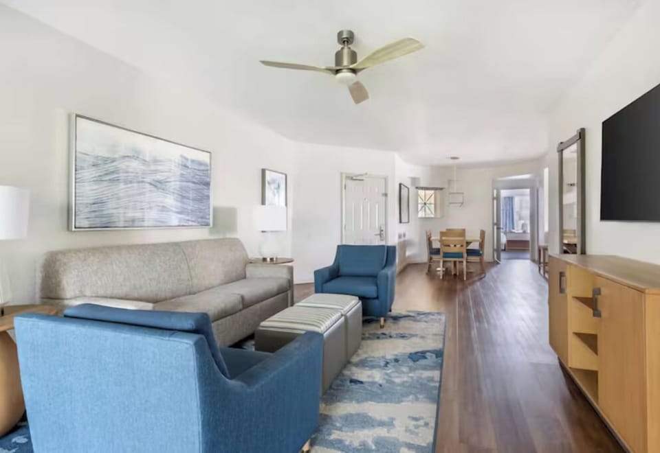 Gather together in a bright suite with roomy seating.