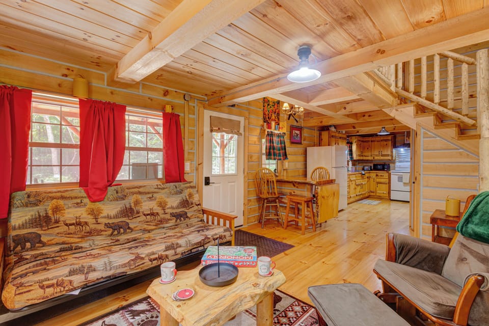 Cozy rustic cabin with warm wood interiors and an open living space