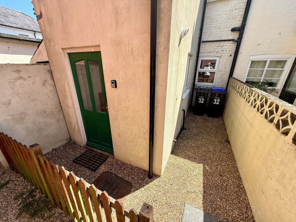 Small enclosed outdoor space with separate access
