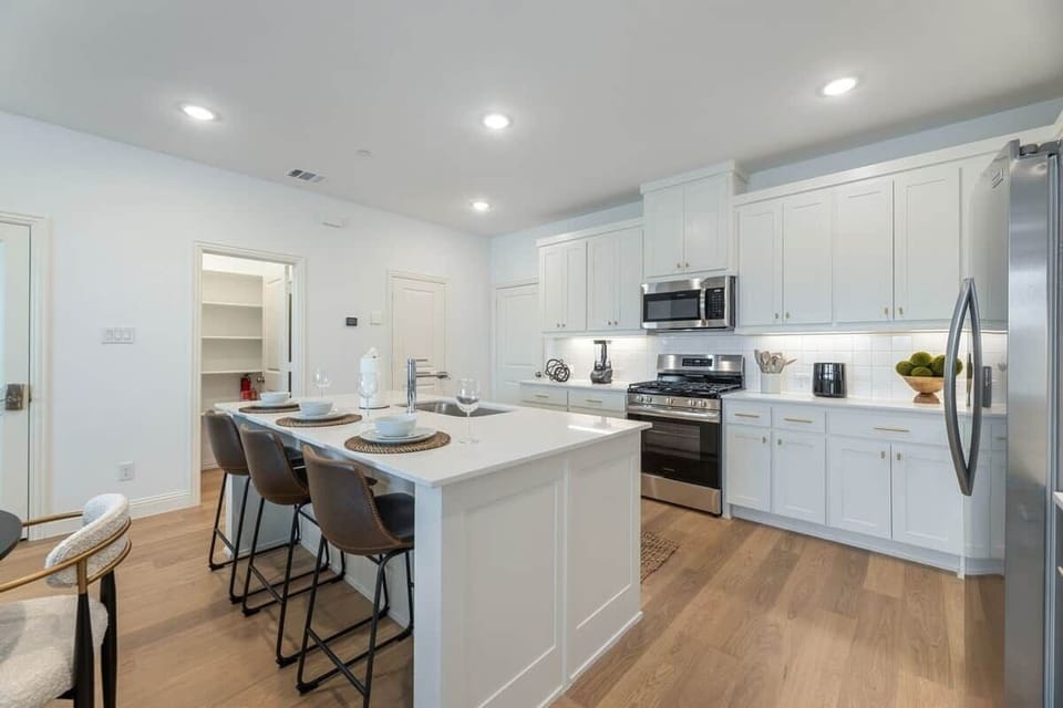 Large fully stocked kitchen with every amenity you could need to prepare meals during your stay.  From the air-fryer to the Ninja blender, toaster oven and coffee/cocoa/tea bar and more, we've got you covered.