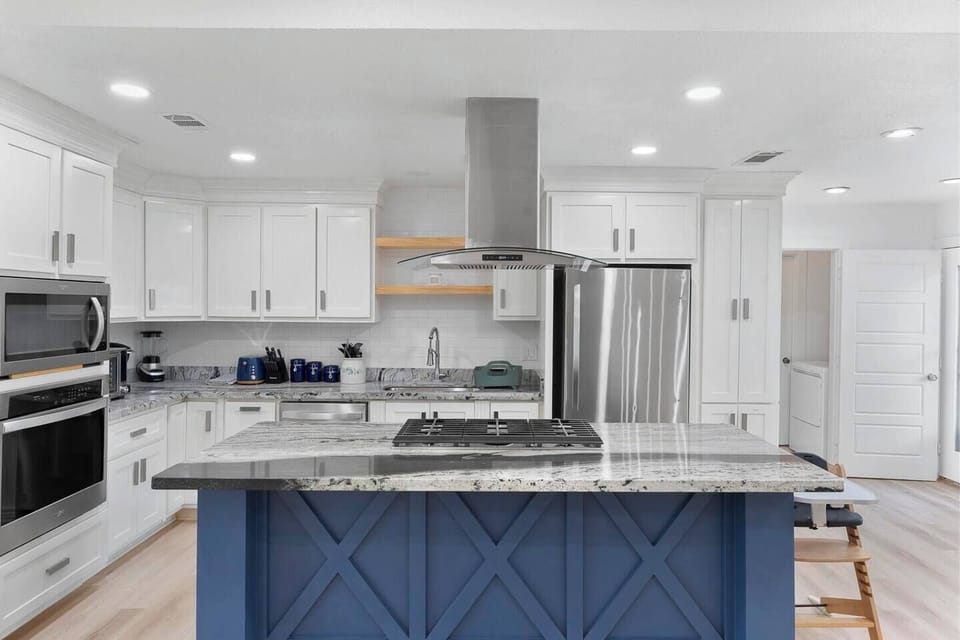 Fully equipped modern kitchen perfect for cooking, gathering, and sharing meals together.