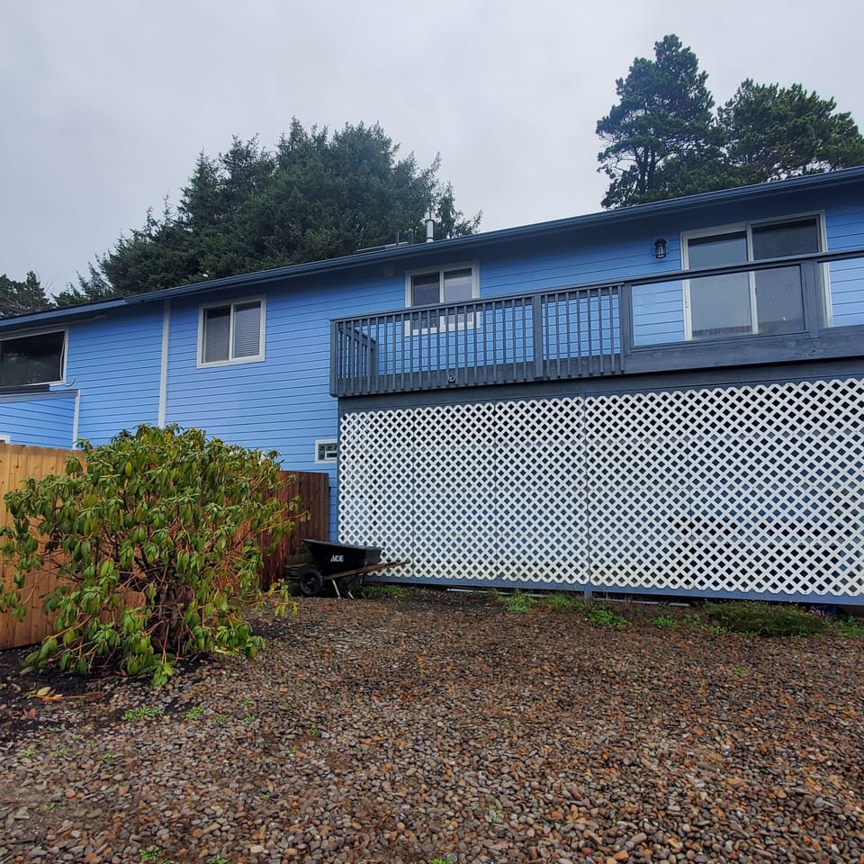 Side of House and Car Park