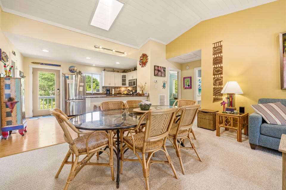 The open-concept dining area is perfect for evening meals and enjoying time together.