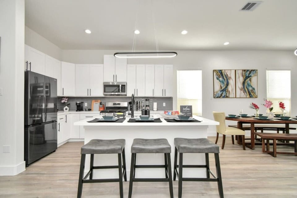 White fully equipped modern kitchen.