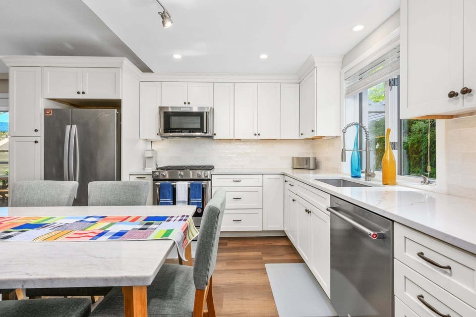 Fully equipped kitchen with everything needed for cooking and dining during your stay