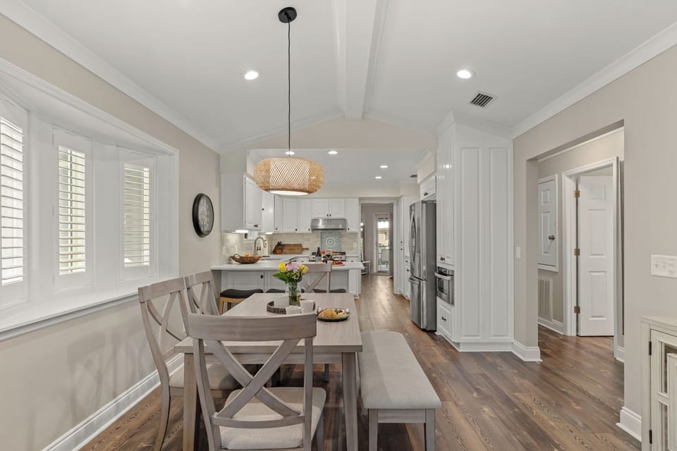 Elegant, dedicated dining space seamlessly connecting the kitchen and living areas.
